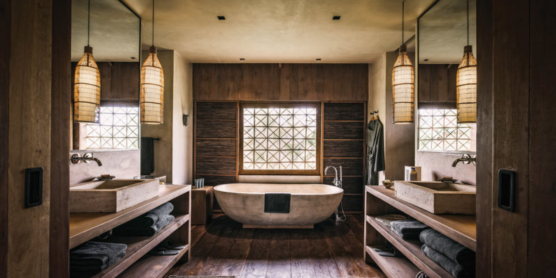 Phum Baitang hotel's guest bathrooms.