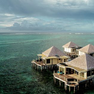 Coconuts Beach Club Resort & Spa over water fale