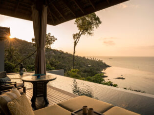 sunset on the deck of a villa at Four Seasons Resort Koh Samui