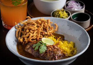 a bowl of Khao Soi in Chiang Mai