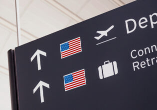 Sign with American flag at airport