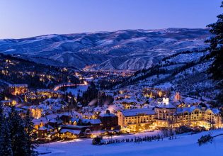 Beaver Creek Resort Winter Skiing at Dusk - Scenic view of village illuminated at night with ski runs.