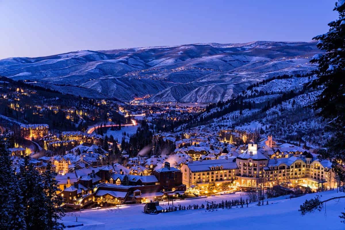 Beaver Creek Resort Winter Skiing at Dusk - Scenic view of village illuminated at night with ski runs.