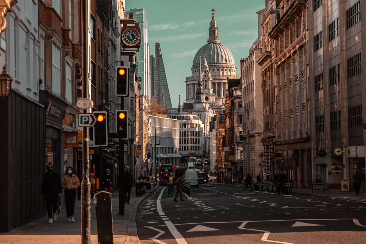 Beautiful view of the busy Fleet Street in London with famous buildings in the background