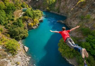 Man doing bungee jump from Kawarau Bridge Bungy in Queenstown, New Zealand