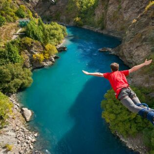Man doing bungee jump from Kawarau Bridge Bungy in Queenstown, New Zealand