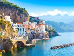 Morning view of Amalfi cityscape on coast line of mediterranean sea, Italy