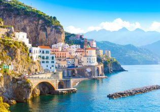 Morning view of Amalfi cityscape on coast line of mediterranean sea, Italy