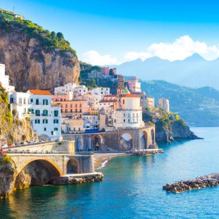Morning view of Amalfi cityscape on coast line of mediterranean sea, Italy