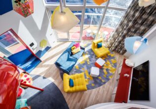 Aerial view of the family room inside the Ultimate Family Townhouse on Icon of the Seaa