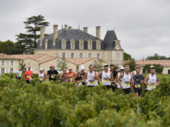 Runners in the Marathon du Médoc in Bordeaux, France
