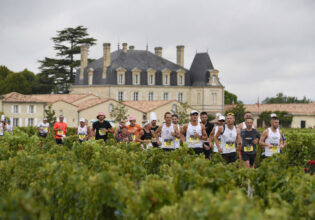 Runners in the Marathon du Médoc in Bordeaux, France