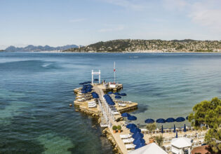 an aerial view of a private beach at Belles Rives