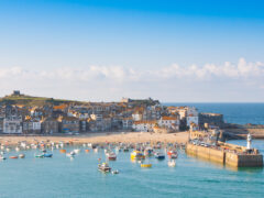 The charming boats and golden sands of St Ives Harbour in Northern Europe and the UK.