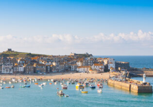 The charming boats and golden sands of St Ives Harbour in Northern Europe and the UK.