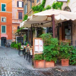 a Trastevere restaurant at an old street in Rome