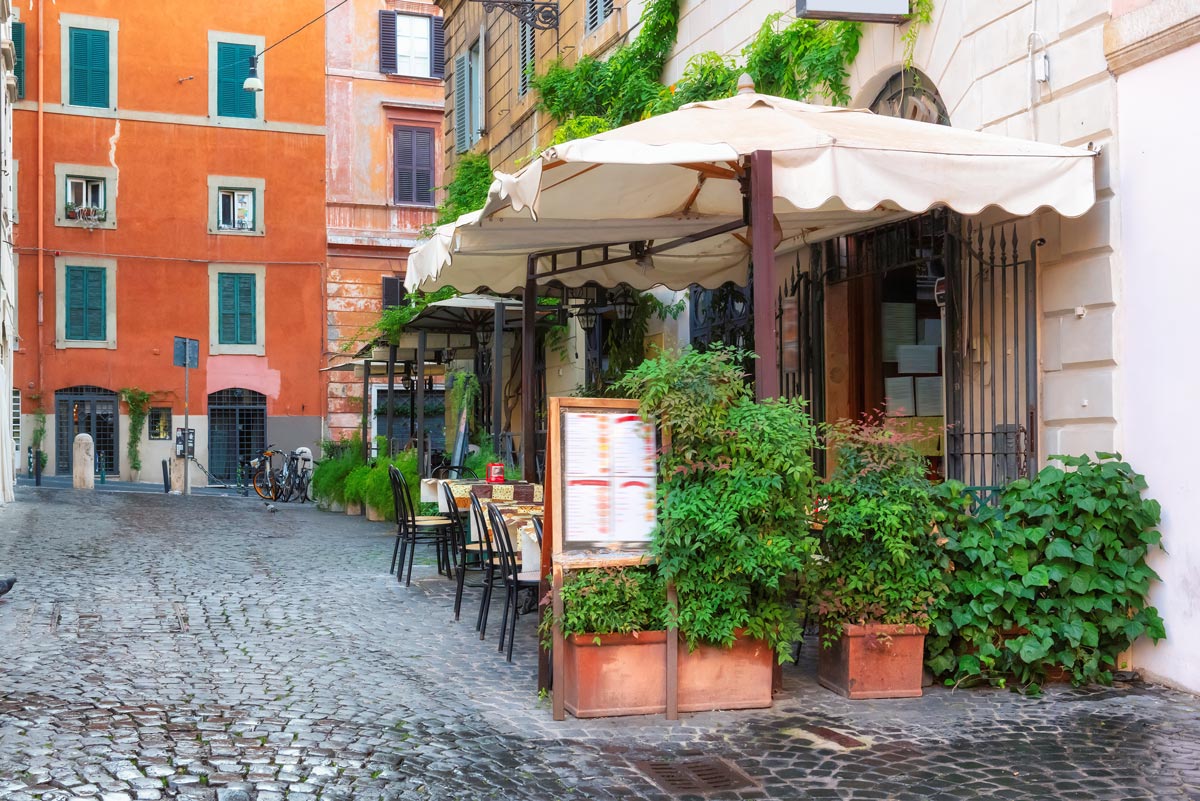 a Trastevere restaurant at an old street in Rome