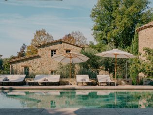 an outdoor pool with sun loungers at Vocabolo Mosacatelli