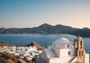 a church on the top of the hill in Milos, Greece