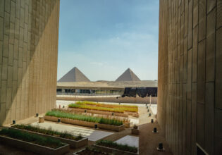 View of Pyramids of Giza from the main viewing platform of the Grand Egyptian Museum