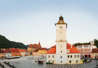 Front and centre - The clock tower overlooking Brasov's Council Square, Transylvania.