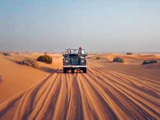tour group in Vintage Land Rover on hero experiences Platinum Heritage
